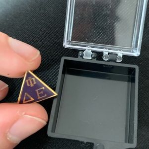 Delta Phi Epsilon new member pin